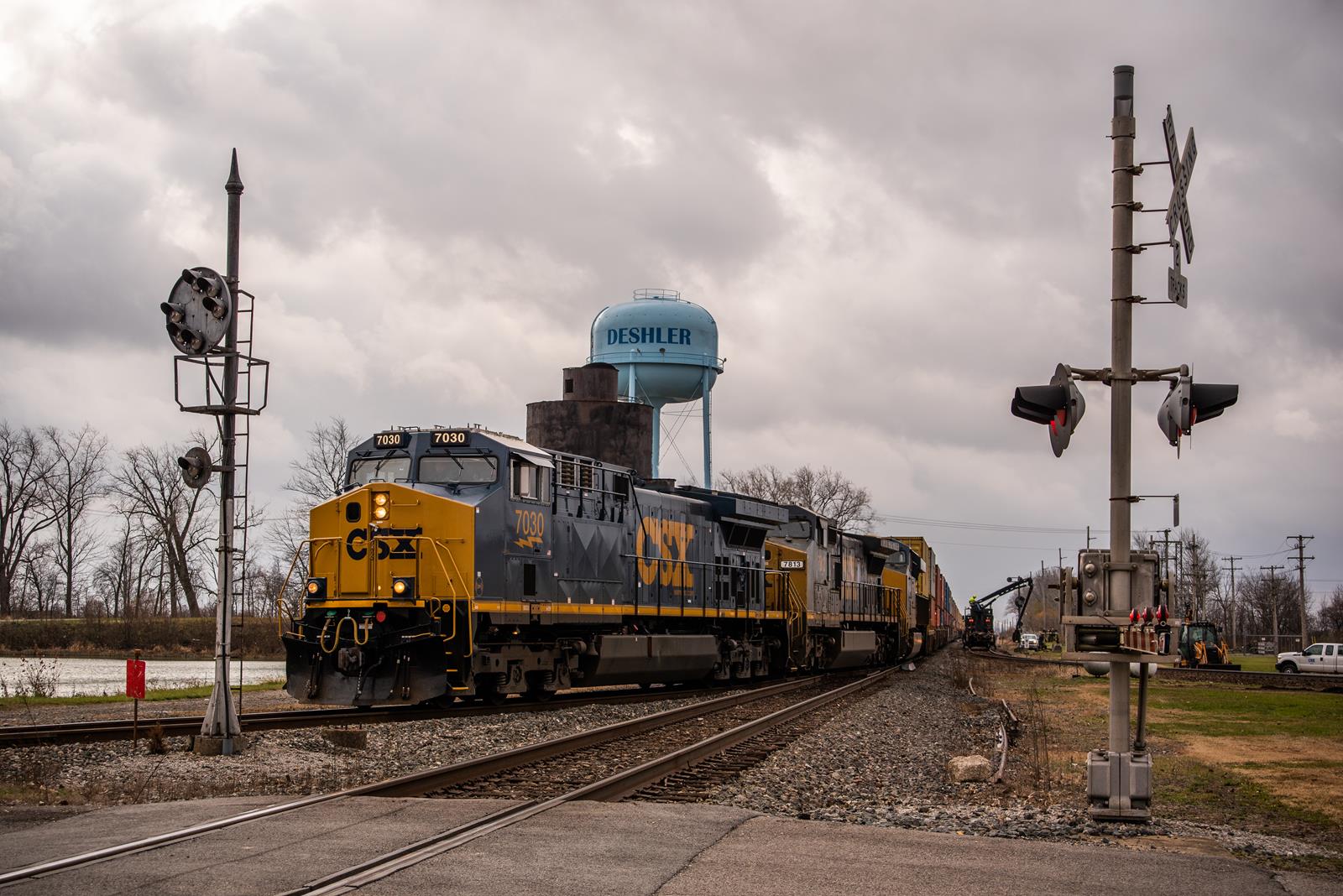 CSXT 7030 is a class GE AC4400CW and  is pictured in Deshler, Ohio, USA.  This was taken along the Toledo Subdivision on the CSX Transportation. Photo Copyright: Spencer Harman uploaded to Railroad Gallery on 11/17/2022. This photograph of CSXT 7030 was taken on Thursday, November 17, 2022. All Rights Reserved. 